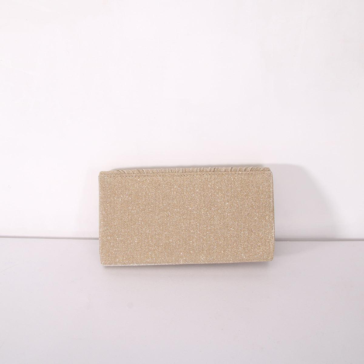 Pochette enveloppante à rayures et paillettes