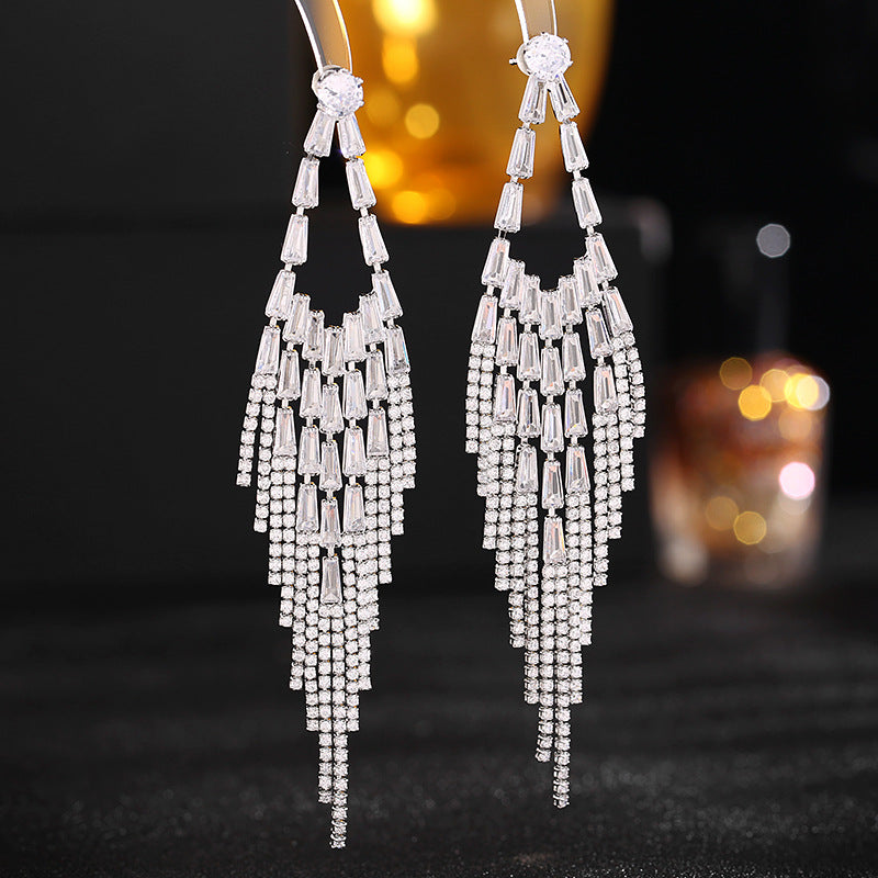 Boucles d'oreilles longues Premium en diamant