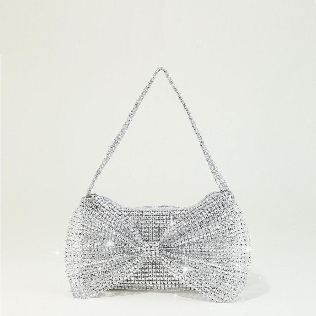 Pochettes brillantes avec nœuds en strass
