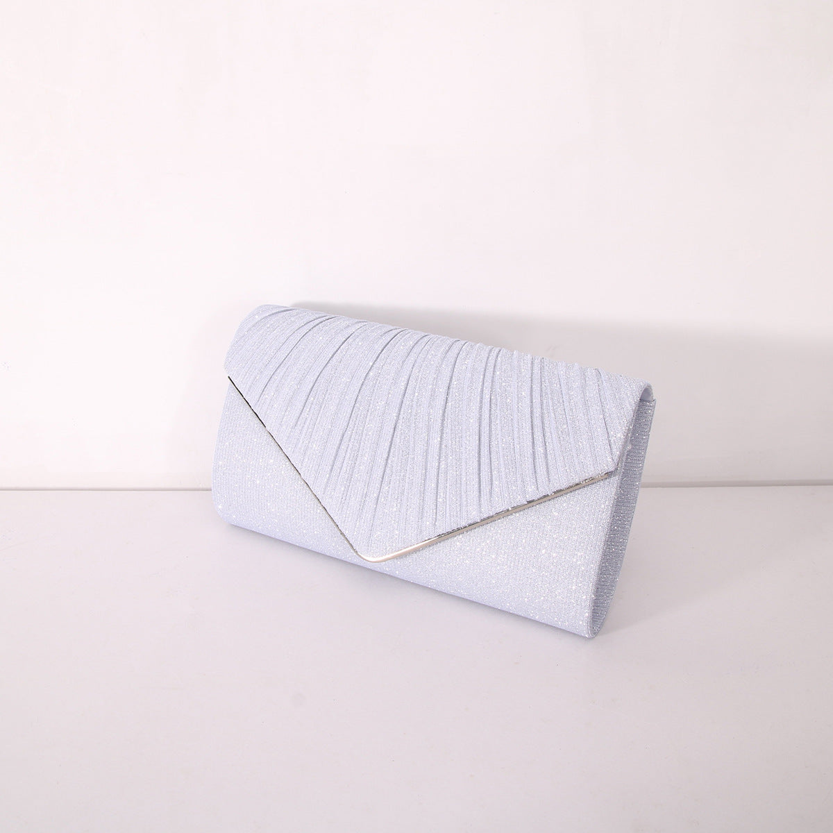 Pochette enveloppante à rayures et paillettes