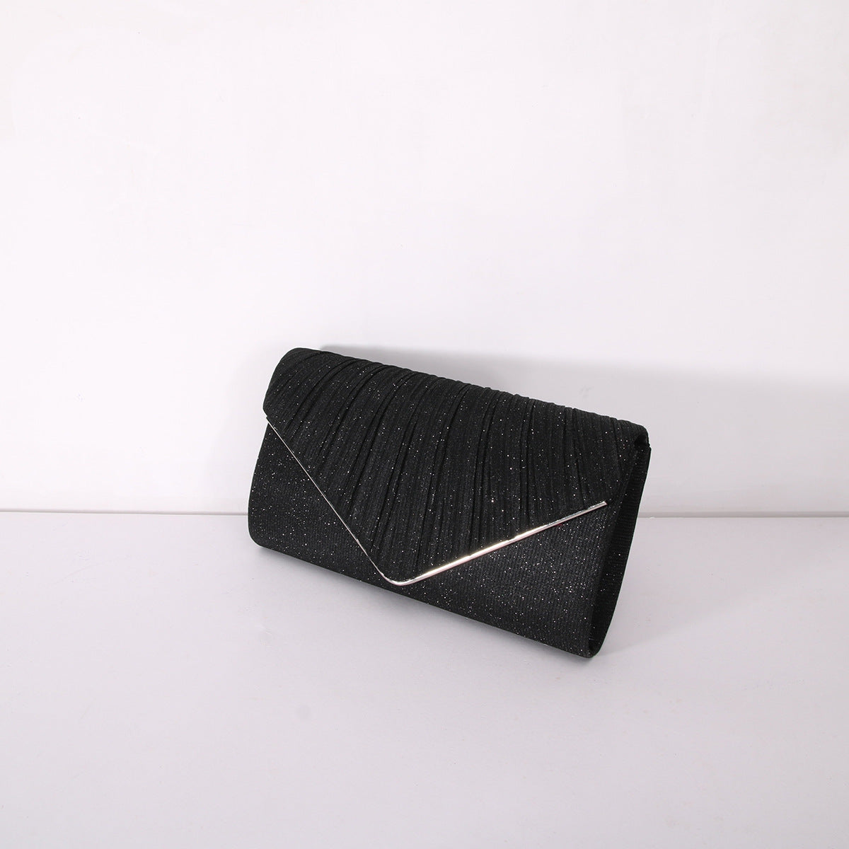 Pochette enveloppante à rayures et paillettes