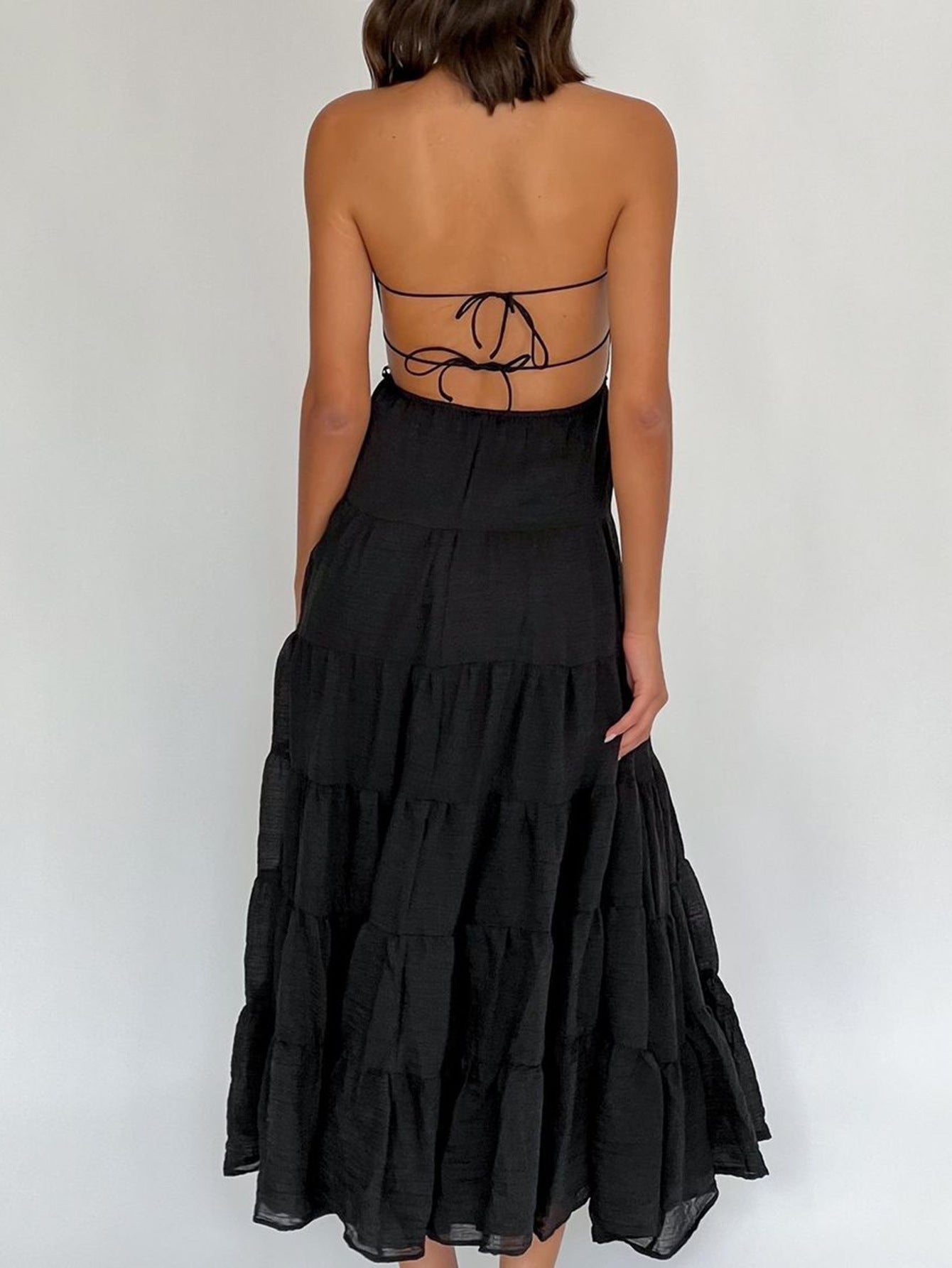 Robe Invitée Mariage Noire Licou Dos Nud Coupe Cintrée Longueur Cheville