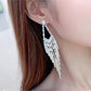 Boucles d'oreilles longues Premium en diamant